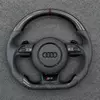 Gloss carbon fiber flat bottom Audi RS steering wheel with dark brown center mark and perforated black Nappa leather grips JIONX