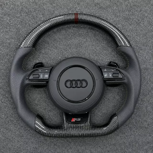 Gloss carbon fiber flat bottom Audi RS steering wheel with dark brown center mark and perforated black Nappa leather grips JIONX