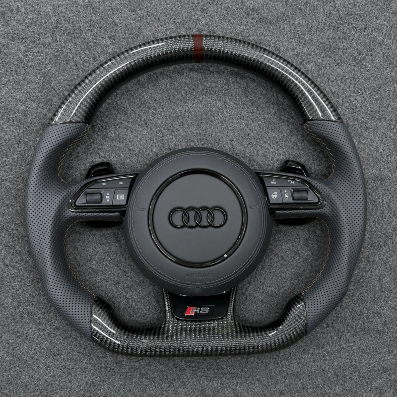 Gloss carbon fiber flat bottom Audi RS steering wheel with dark brown center mark and perforated black Nappa leather grips JIONX