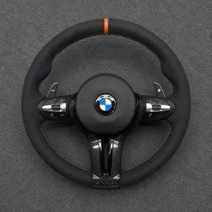 Custom BMW M3 and 3 Series Alcantara steering wheel with orange center stripe, yellow stitching and carbon fiber trim