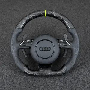 Custom Audi Q3 8U forged carbon fiber flat-bottom wheel with perforated Nappa leather, yellow center stripe and extended paddles