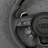 Breathable perforated leather grips closeup custom audi steering wheel Jionx