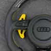 Semi perforated leather grips with yellow stitching on Audi LED carbon flat bottom replacement wheel