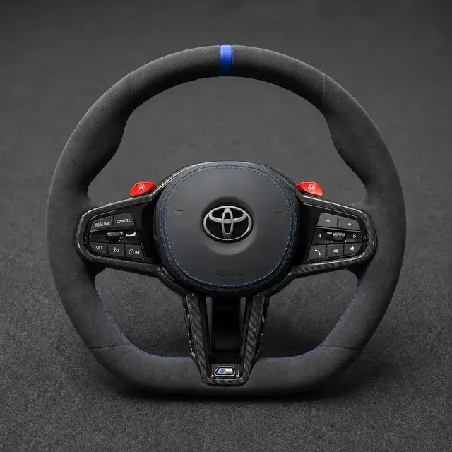 Toyota CS style Alcantara custom steering wheel with blue center stripe, stitching and real carbon fiber trim