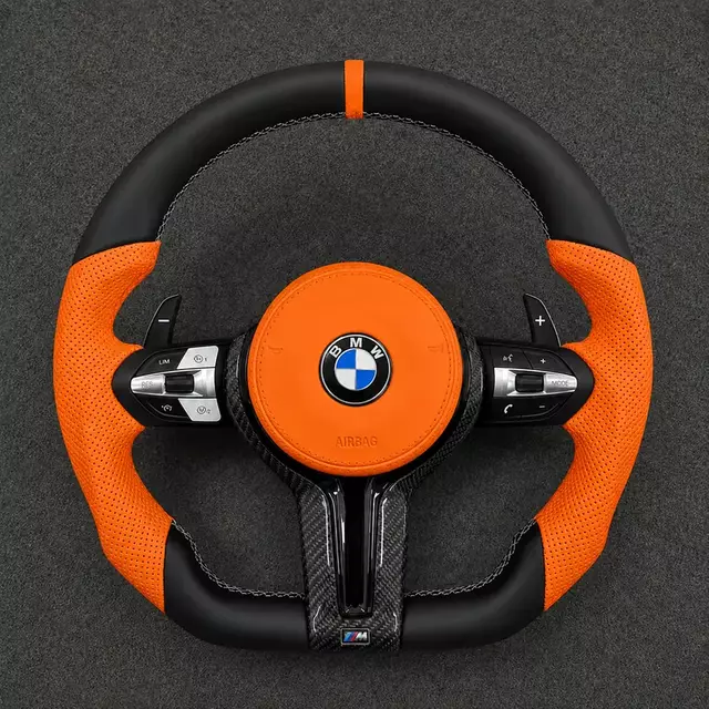 Custom orange Nappa leather steering wheel for BMW 2 Series M2 with real carbon fiber trim and perforated grips