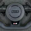 S line badge close-up on JIONX flat bottom sport steering wheel for Audi B8 A4 A5