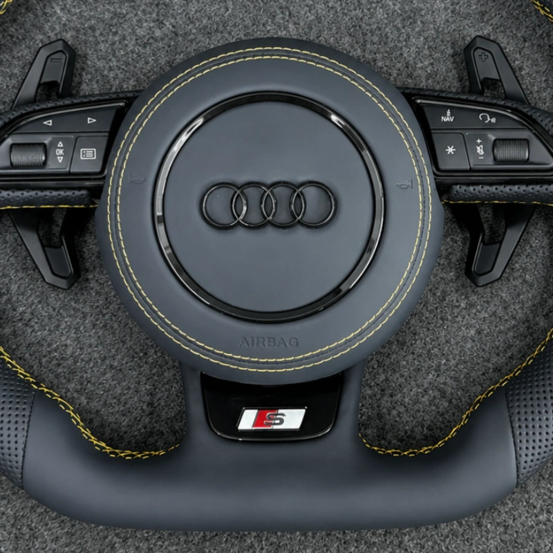 S line badge close-up on JIONX flat bottom sport steering wheel for Audi B8 A4 A5