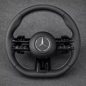 Mercedes C/E dragonfly-style black Nappa leather wheel with perforated grips, white stitching, black trim and paddles