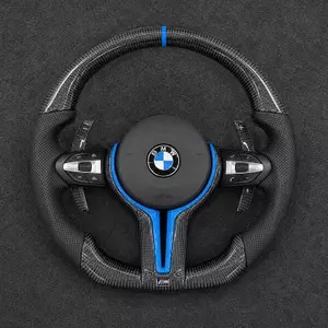 Custom BMW X5 E70 real carbon fiber steering wheel with blue leather grip and sport details