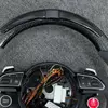Closeup Of Top LED Light Strip On Gloss Carbon Fiber Rim Of Audi Steering Wheel JIONX
